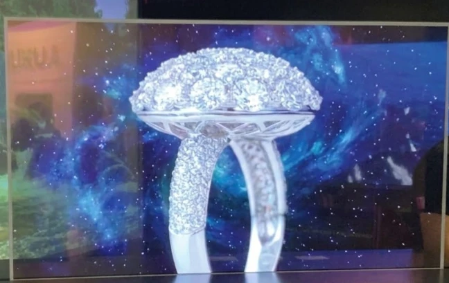 Transparent LCD display screen showcase in a retail environment showing product visibility and digital overlay content Transparent LCD display screen showcase in a retail environment showing product visibility and digital overlay content